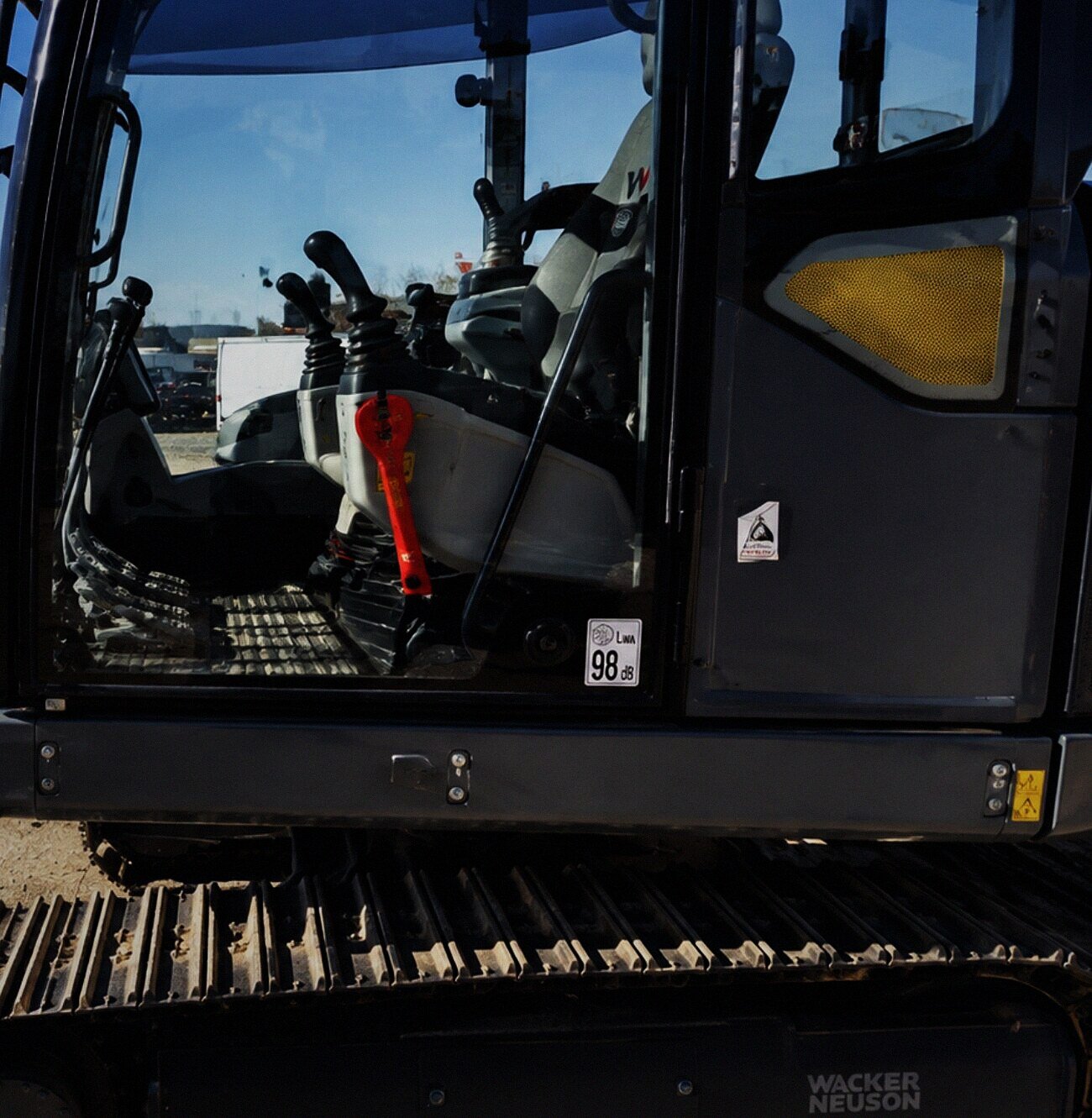 Excavator cab glass at a job site